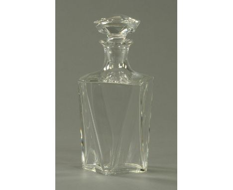 A Baccarat glass decanter, 20th century, with square faceted stopper above the rectangular body and with inverted tapering an