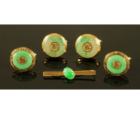 Two pairs of Chinese 14 ct gold cufflinks, each with longevity character framed by jade and with pierced border, and a Chines