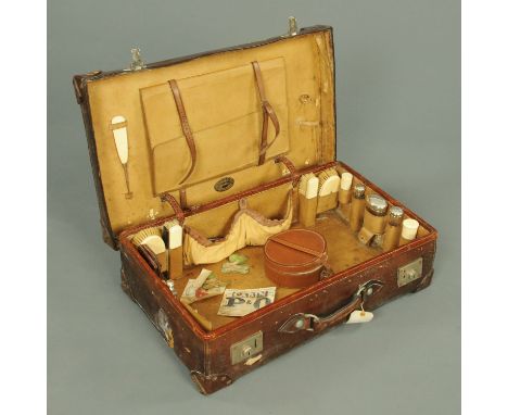 A Vintage leather toiletry case by R.W. Forsyth Limited, makers Edinburgh and Glasgow, the lid with impressed initials F.A.G.