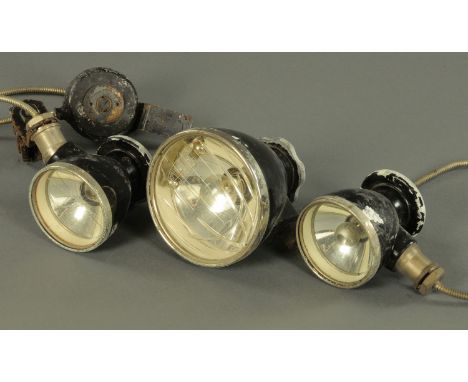 A pair of Carl Zeiss Vintage car spot lights, early to mid 20th Century, integral rear mirror and mounted upon a knuckle supp