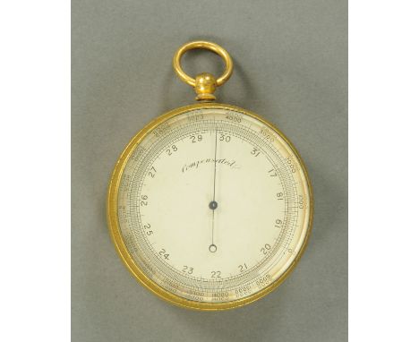A large 19th century gilt brass cased pocket barometer.  Diameter 6.5 cm. 
