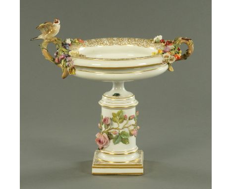 A large German porcelain table centre piece, floral encrusted and with Finch and insects.  Height 41 cm, diameter 32 cm (see 