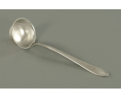 A Dutch silver soup ladle, stamped "900".  Length 31 cm, 178 grams. 