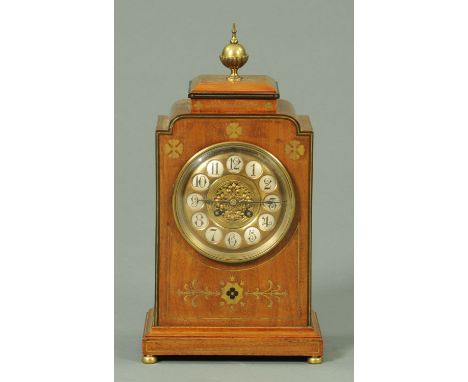 An Edwardian brass inlaid mahogany bracket clock, with French two-train striking movement by Mougin.  Height 40 cm.