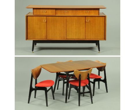 A vintage G Plan Tola and Black dining room suite, 1957, the four chairs with butterfly backs, printed marks for Ernest Gomme