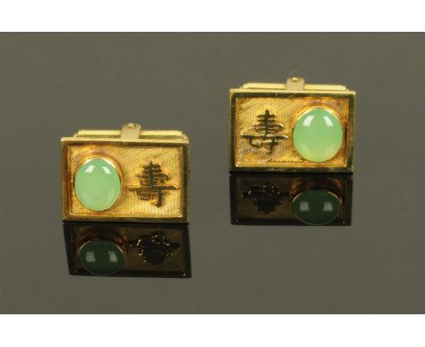 A pair of Chinese 14 ct gold cufflinks, 20th century, rectangular,  with Chinese character for longevity beside an inset oval