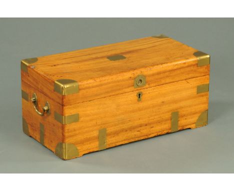 A small 19th century camphorwood brass bound trunk, with brass carrying handle to either side.  Width 63 cm, height 28 cm, de