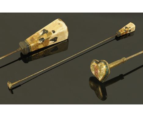 A Japanese Satsuma hat pin, Meiji period, having a square tapering finial, decorated with Bijin and with heart shaped Satsuma