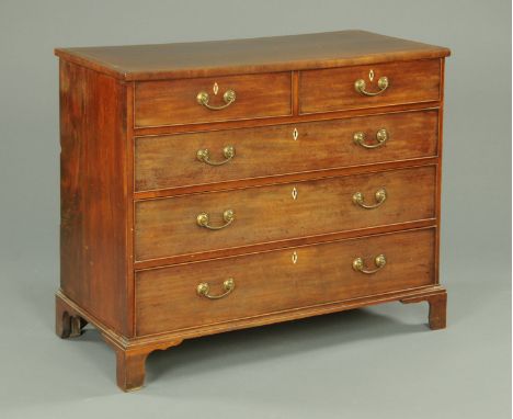 A George III mahogany chest of drawers, with boxwood strung and crossbanded edge above two short and three long graduated dra