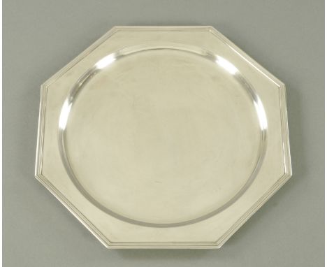 A German silver octagonal salver, 20th century, with dished centre, with inscription to the reverse "Presented to Peter Ogilv