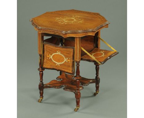 A late Victorian rosewood bone inlaid shaped occasional table, with four hinged shelf flaps and raised on turned legs united 