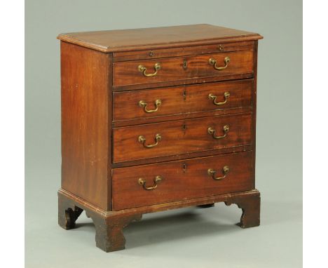 A George III mahogany chest of drawers, with slide above four long graduated drawers with brass drop handles and all raised o