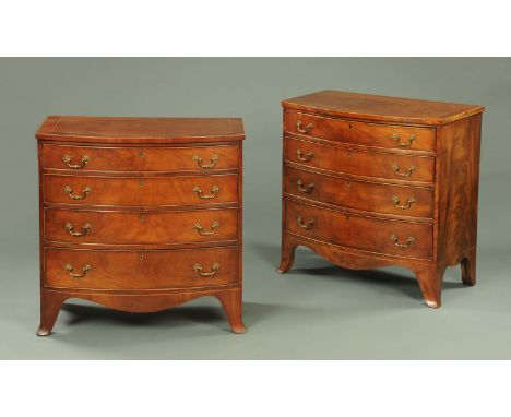 A pair of George III style mahogany bowfronted chests of drawers, each with boxwood strung and crossbanded edge above four lo