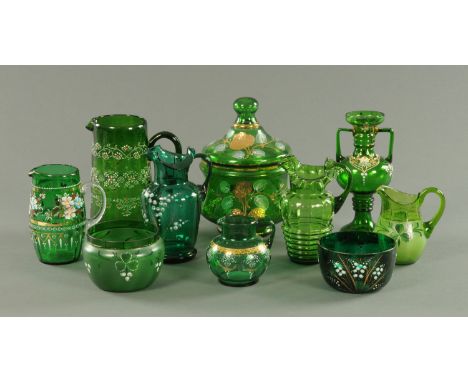 A collection of Victorian emerald green and enamelled glass ware, comprising six jugs, two bowls, a vase and a bowl with cove