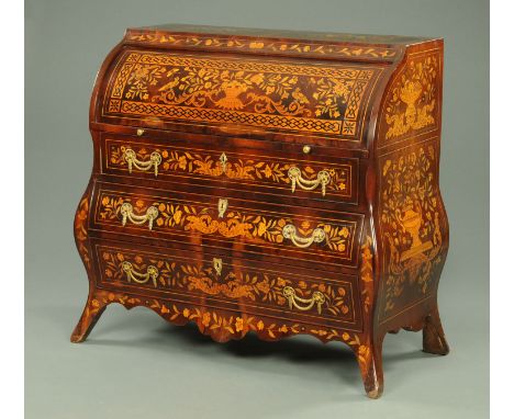A 19th century Dutch marquetry bureau, with cylinder front and slide above three drawers with brass drop handles and all rais