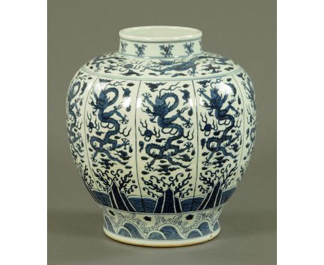 A Chinese vase, the neck decorated with peaches, the shoulder and body with dragons amongst clouds with flaming pearl, all ab