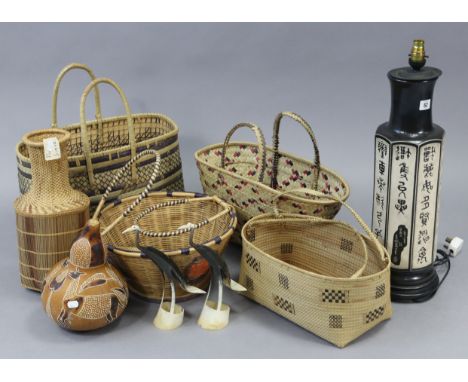 A Japanese-style metal table lamp; an Aboriginal gourd vessel, various wicker baskets &amp; bowls; &amp; sundry other items.