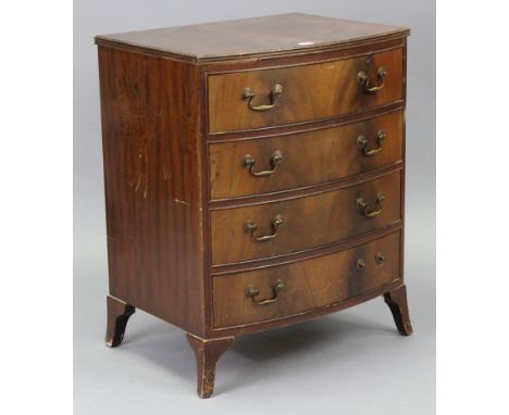 A reproduction mahogany bow-front small chest fitted four long drawers with brass swan-neck handles, and on bracket feet, 24­