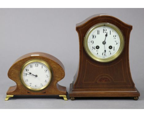 An early 20th century mantel clock with white enamel dial, striking movement, in inlaid mahogany case, 10” high, w.a.f.; &amp