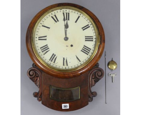 An early 20th century drop-dial wall clock, with black roman numerals to the 11” diam. white enamel dial, &amp; in walnut cas