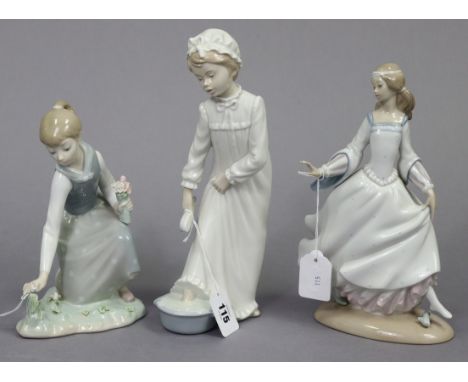 A Lladro Nao porcelain ornament in the form of a standing girl figure with a scrubbing brush in her hand &amp; with her right