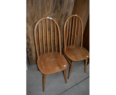 A pair of Ercol style hoop and stick back kitchen chairs