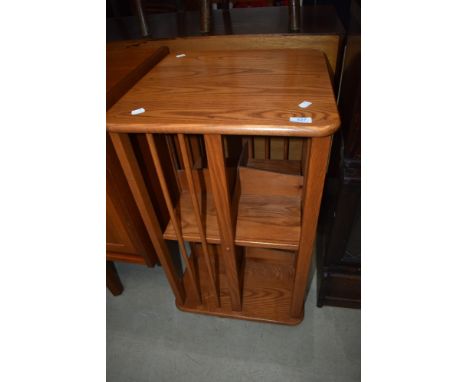 An Elm Ercol style revolving bookcase
