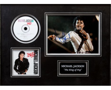 JACKSON MICHAEL: (1958-2009) American Pop Singer. Signed colour 6.5 x 7 photograph of Jackson in a half length pose singing i