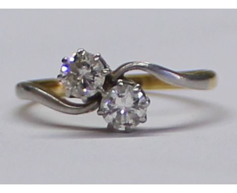 18ct gold and platinum diamond crossover ring, each approximately 0.25ct, size I, total weight 2g&nbsp;