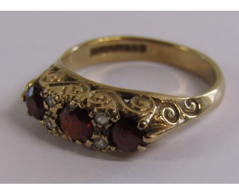9ct gold ring with 3 rubies and 4 faux diamonds - ring size Q - total weight 3.9g