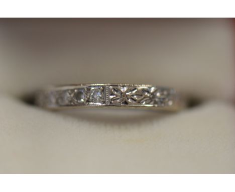 18ct white gold and diamond eternity ring, total weight 4.4g, size