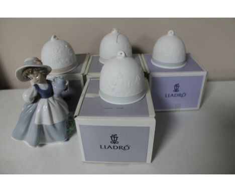 Four boxed Lladro bells together with a Nao figure of a girl