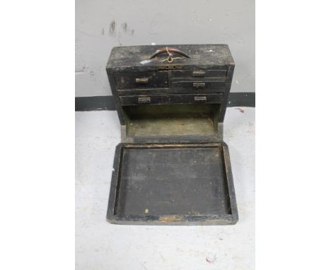 An antique wooden tool box 
