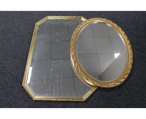 A hexagonal gilt framed bevelled mirror together with an oval gilt framed mirror 