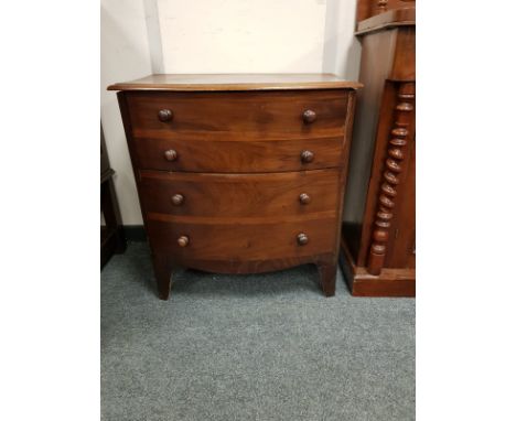 A 19th century bow-fronted mahogany commode chest, width 66 cm 