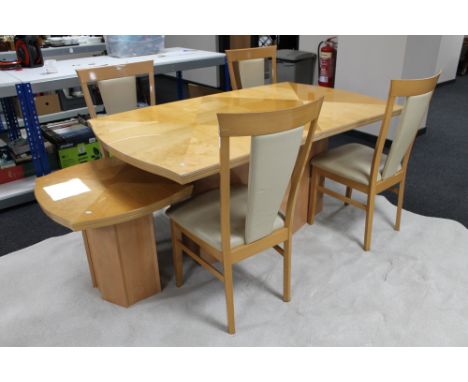 A contemporary pine effect high gloss pedestal dining table and four high backed chairs and matching lamp table 