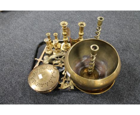 A tray of antique and later brass ware, planter, candlesticks, chestnut roaster, ornamental pistols etc 