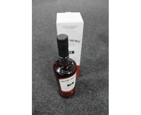 A bottle of Bowmore single malt scotch aged 15 years 700ml in box 