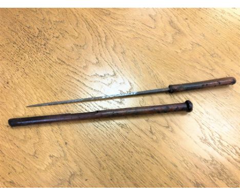 An unusual George V swagger stick/sword stick, bound in leather, length 56cm. * Property of Lt Cl. K. C. Booker (see lot 533)