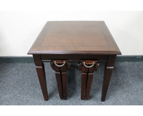 A contemporary inlaid mahogany lamp table fitted with two tables beneath 