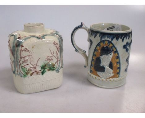 An 18th century pottery caddy by William Greatbatch, circa 1765; a 19th century Prattware mug (2)  