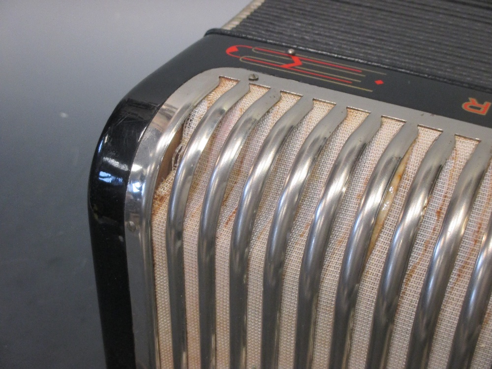 A Hohner Trichord III accordion, cased in - Cheffins Fine Art