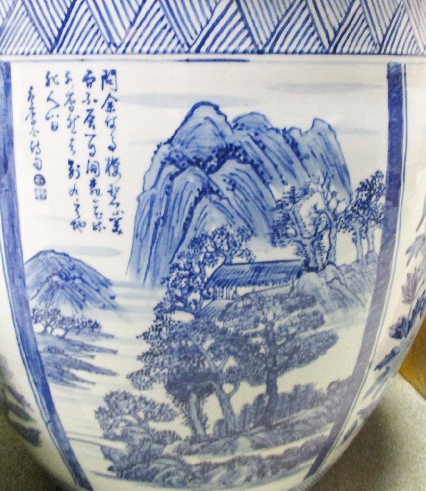 A large blue and white jardiniere, 20th century, painted with alternate