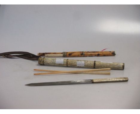 A tortoiseshell cased knife and chopstick set and another in ivory(2)  