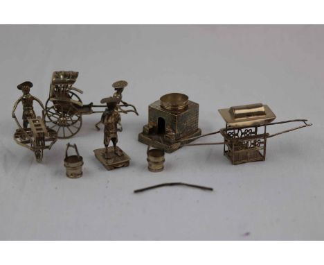 Early 20th century miniature Chinese silver figures to include a rickshaw and driver, sedan chair, farmer with wheelbarrow, w