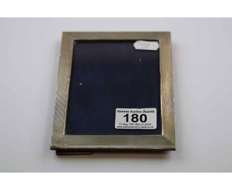 Continental silver rectangular photograph frame, repeating engine turned decoration, easel back, hallmarks partially rubbed, 