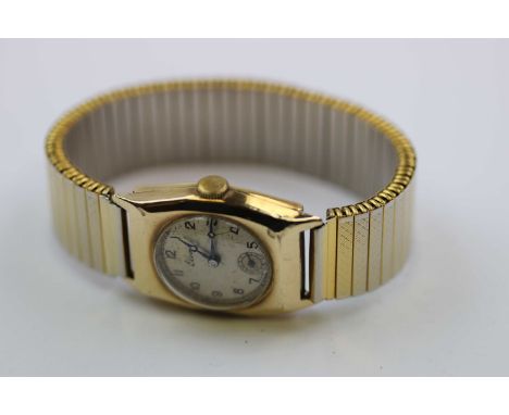 Vintage Gents 9ct Gold Tank style Wristwatch, the metallic dial marked "Elco" with sub-dial at the six position and later exp