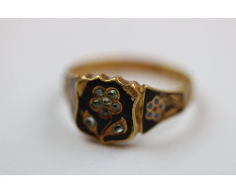 Early Victorian diamond enamelled mourning ring, the central black enamelled panel set with eight small foil backed rose cut 