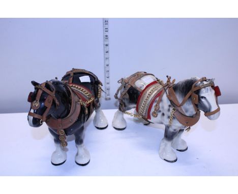 A pair of ceramic shire horses 