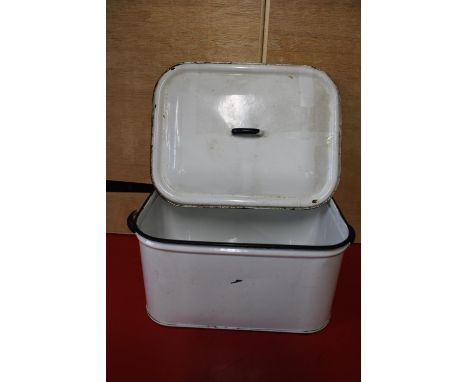 A vintage enamel bin with lid 